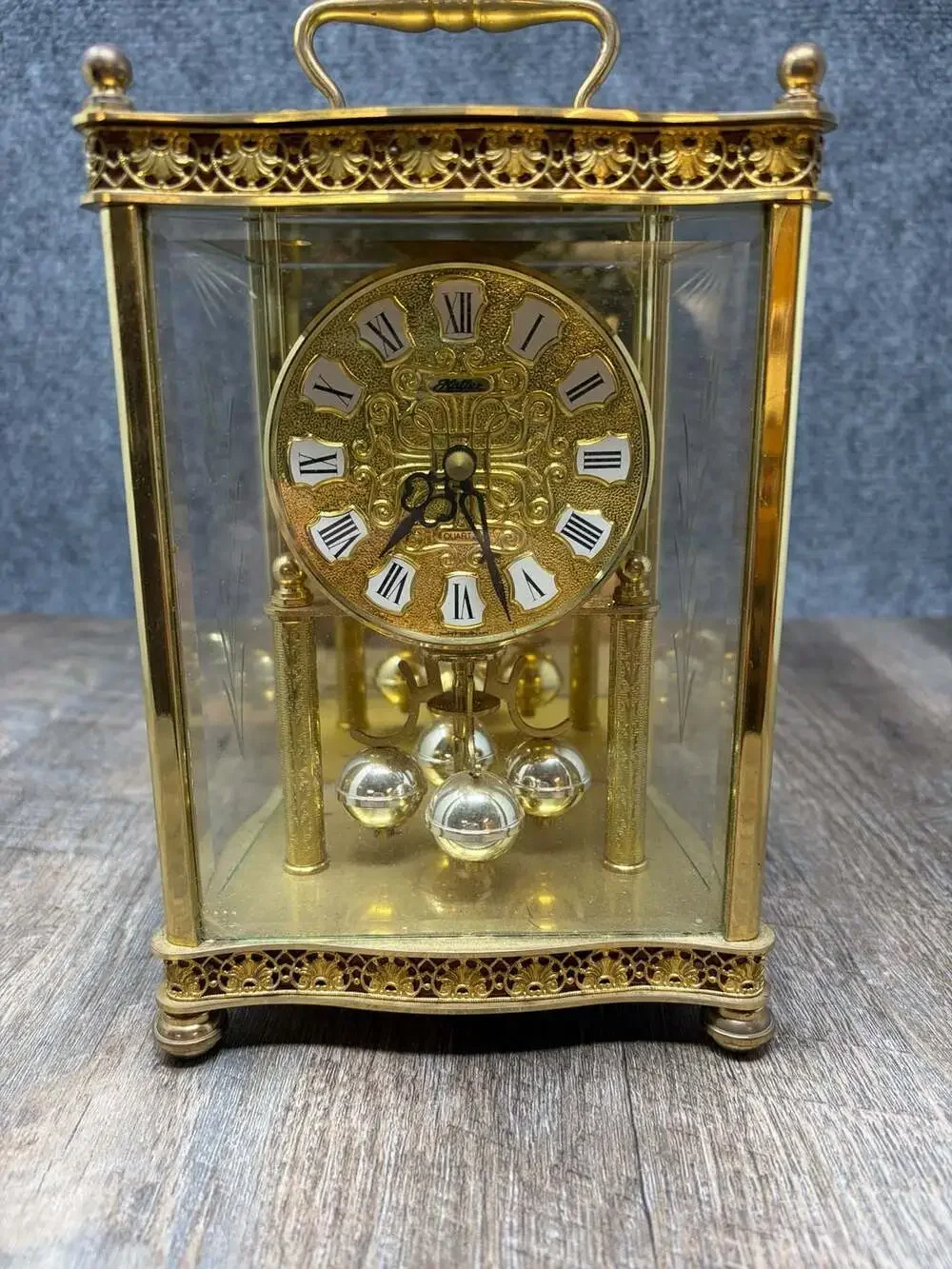 Haller Quartz Anniversary Mantel Clock Rotating Pendulum Glass brass W. Germany